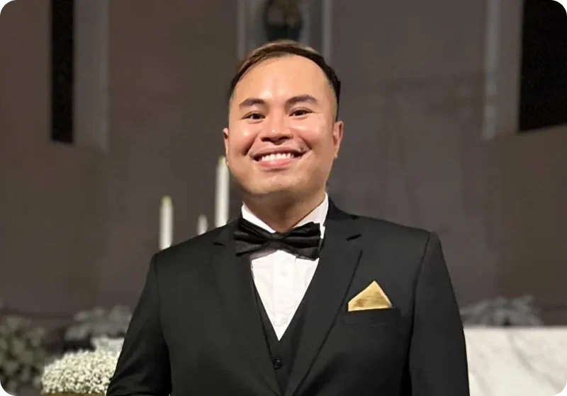 Vivek Birla, Professor and Head of Department, smiling in a tuxedo
